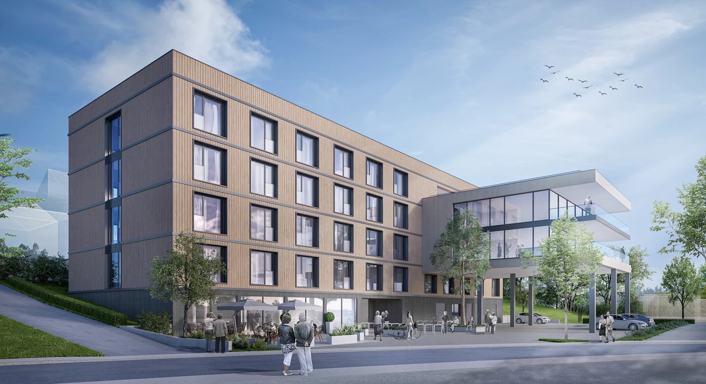 Startseite Modernes vierstöckiges Hotel mit großen Fenstern, einer Sitzgelegenheit im Freien und einem Eingangsvordach – realisiert durch die Generalplanung von SCHATZ Architektur über alle Leistungsphasen hinweg; an einem sonnigen Tag mit blauem Himmel und vereinzelten Wolken sind in der Nähe Fußgänger und Radfahrer unterwegs.